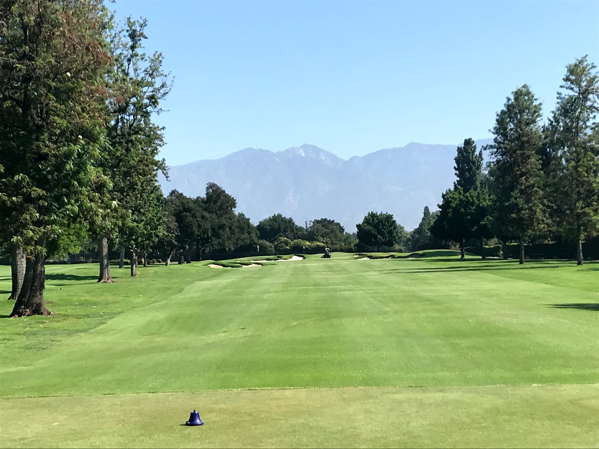 The opening hole at San Gabriel Country Club with the San Gabriel Mountains beyond.