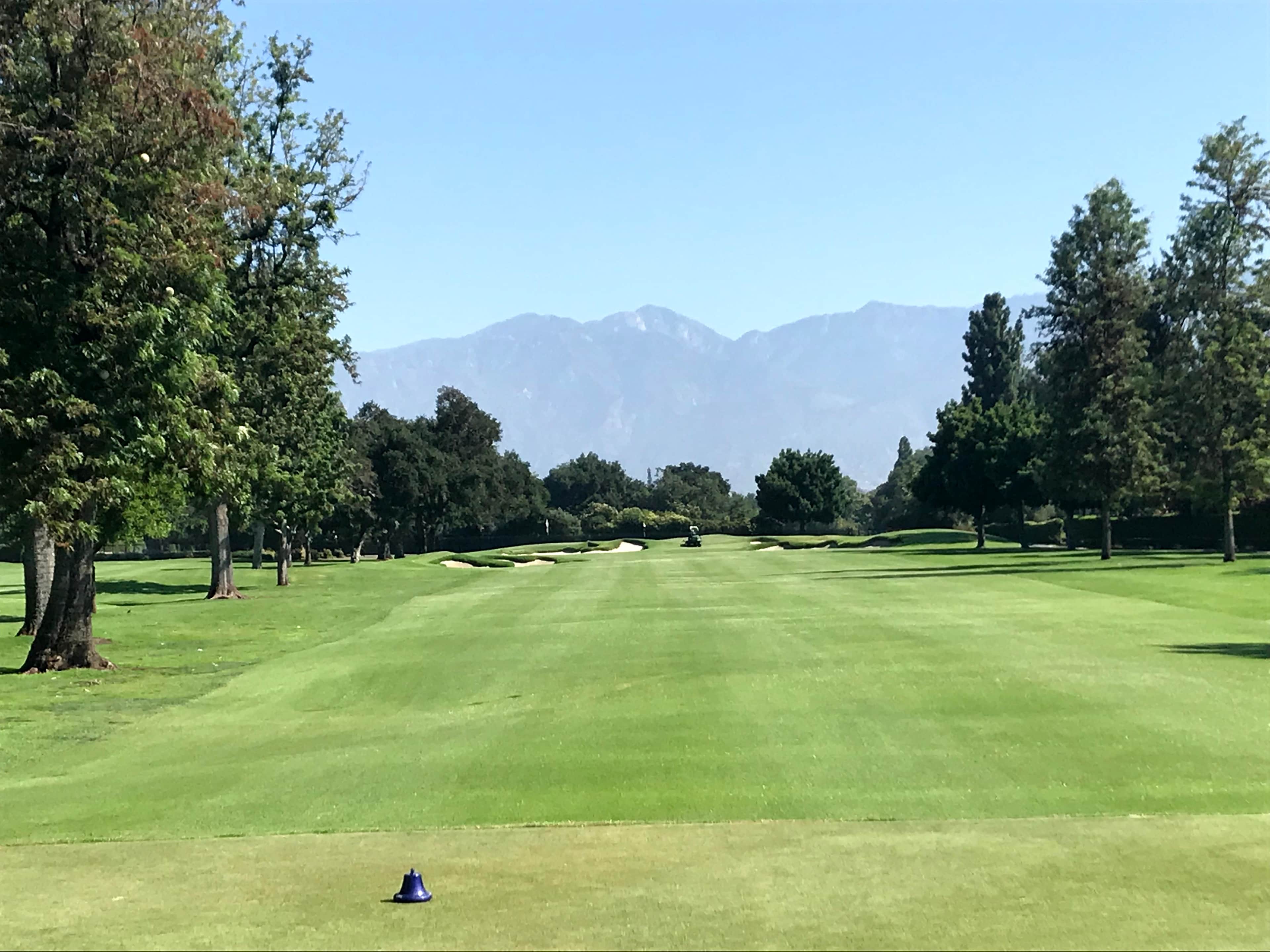 The opening hole at San Gabriel Country Club with the San Gabriel Mountains beyond.