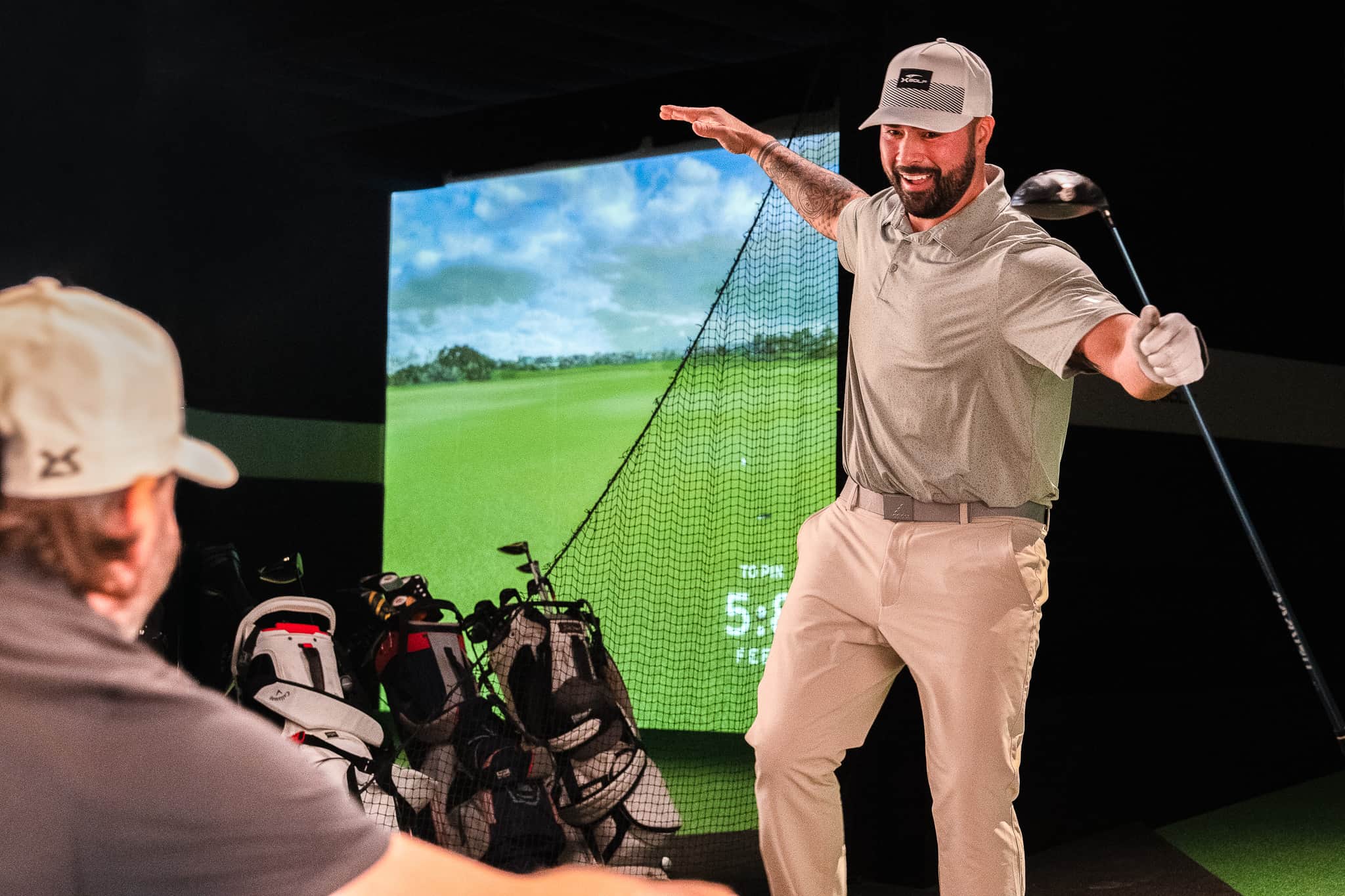 Official X-Golf simulator bay photo courtesy X-Golf (playxgolf.com), used for editorial coverage of X-Golf Torrance.