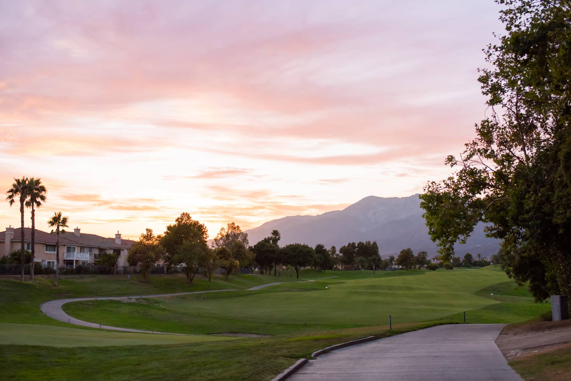 Sierra Lakes Golf Club course photograph, fairway at sunset.