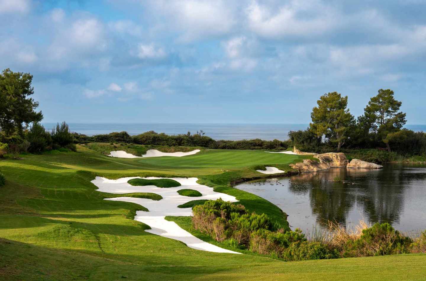 Restored seventh hole at Pelican Hill Ocean South, with new bunkering beside the lake and ocean.
